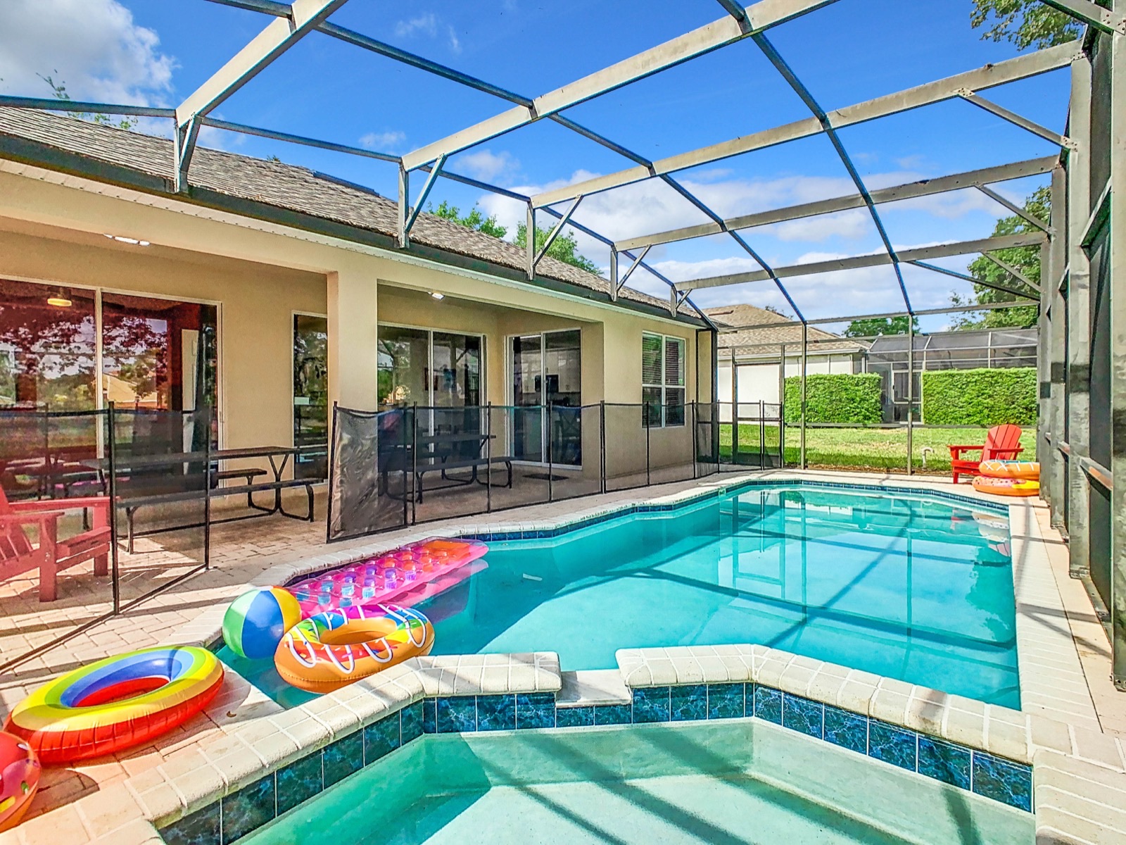 Screened private pool and spa at a FunStay Florida vacation home